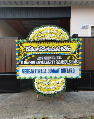Papan Bunga Duka di Kanor